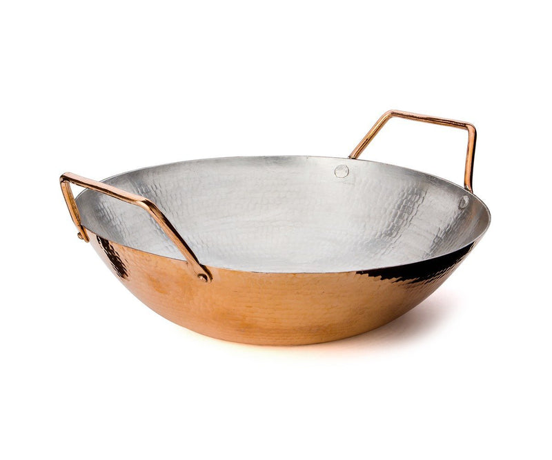12.6” copper wok is perfect for big servings and festive gatherings. Made from hand-hammered copper by our skilled artisans, each wok is guaranteed to serve you for years. Amoretti Brothers