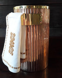 copper ice bucket with hand-engraved lines by amoretti brothers