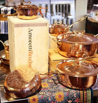 a set of different copper pans, casseroles, frying pan and cocotte by amoretti brothers