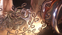 details copper bowl with hand-engraved leaves